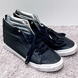 Vans High Top Sneakers in Black with Silver Tongue